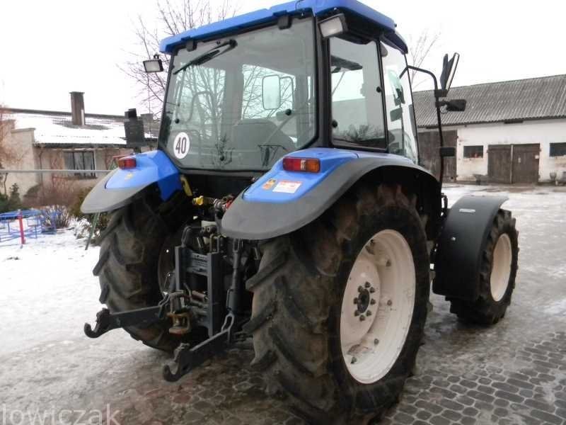 NEW HOLLAND TL 100 z Turem. — zdjęcie 2