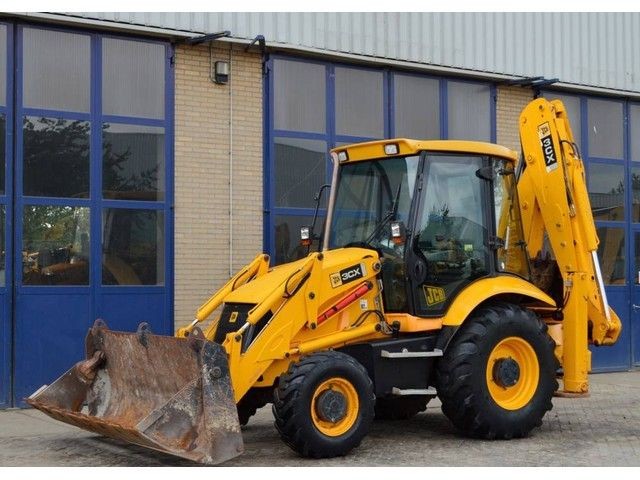 Koparko-ładowarka JCB 3CX — zdjęcie 1