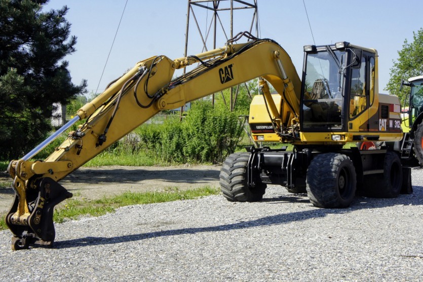 Koparka kołowa CATERPILLAR M 312, 1999r, silnik po kapitalnym remoncie — zdjęcie 1
