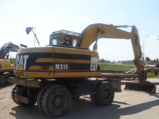 KOPARKA KOŁOWA CATERPILLAR M315 1999 — zdjęcie 1