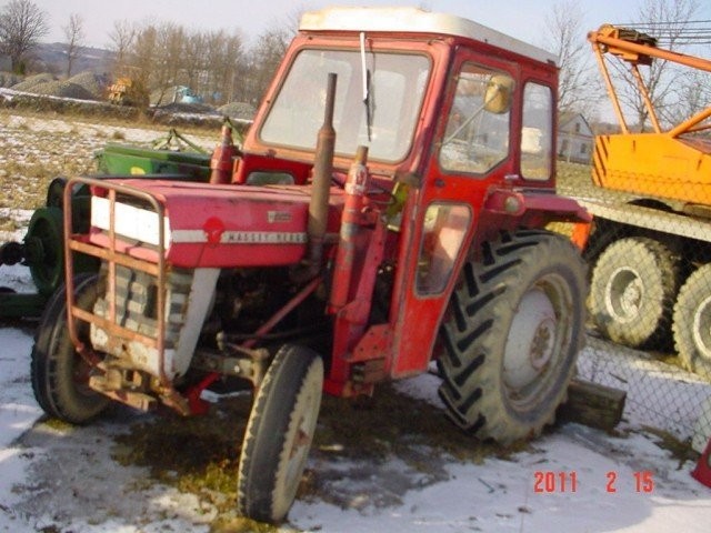Ciągnik rolniczy mf 135 z turem