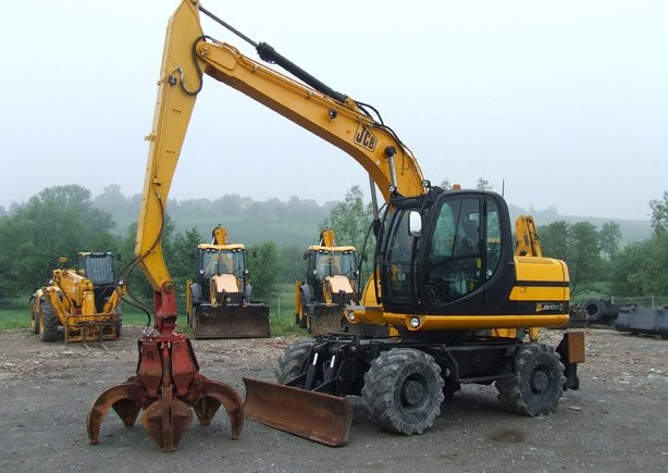 Koparka kołowa JCB JS 130W z roku 2009, — zdjęcie 1