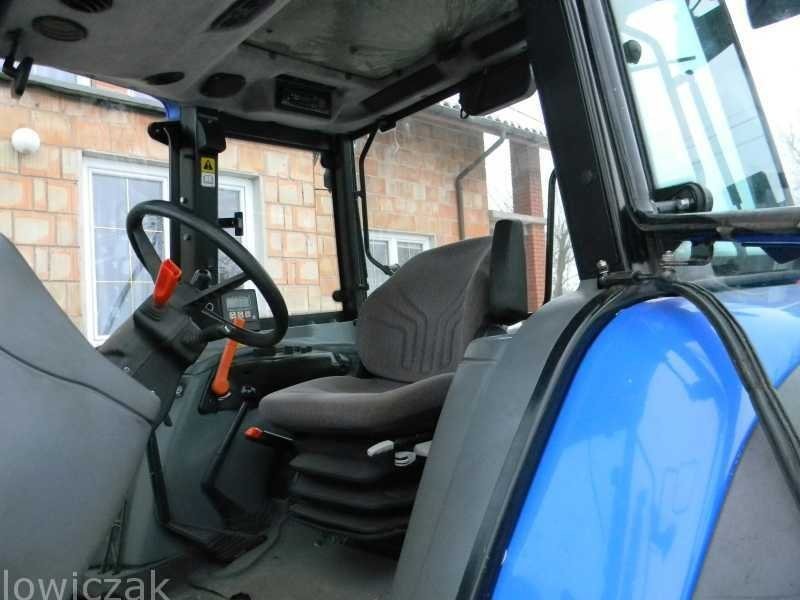 NEW HOLLAND TL 100 z Turem. — zdjęcie 3