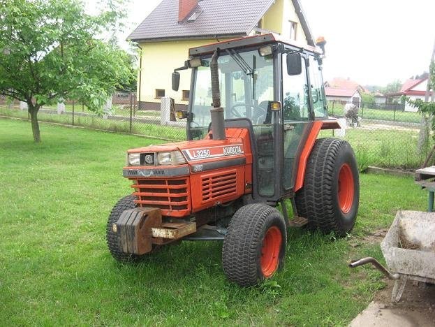 sprzedam ciągnik Kubota i osprzęt zimowy — zdjęcie 4