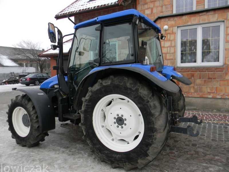 NEW HOLLAND TL 100 z Turem. — zdjęcie 1