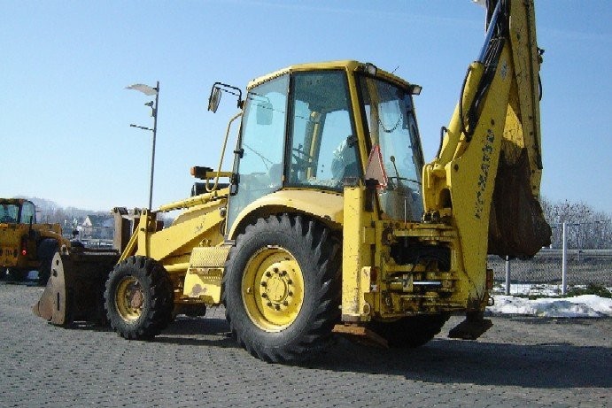 1999rok Komatsu WB 93R koparko ładowarka — zdjęcie 1