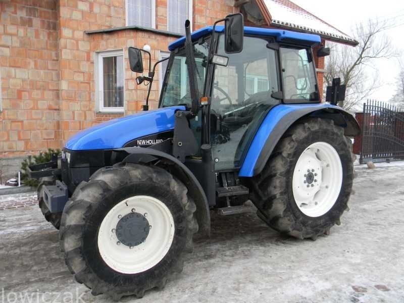 NEW HOLLAND TL 100 z Turem. — zdjęcie 4