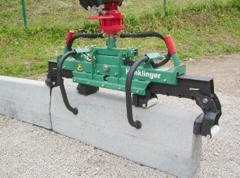 Hydrauliczny chwytak do krawężników — zdjęcie 1
