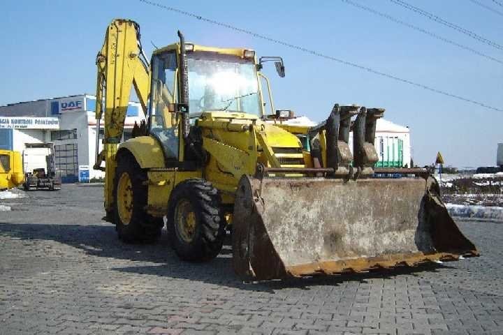 koparko-ładowarka Komatsu WB 93 z 1999 roku — zdjęcie 1