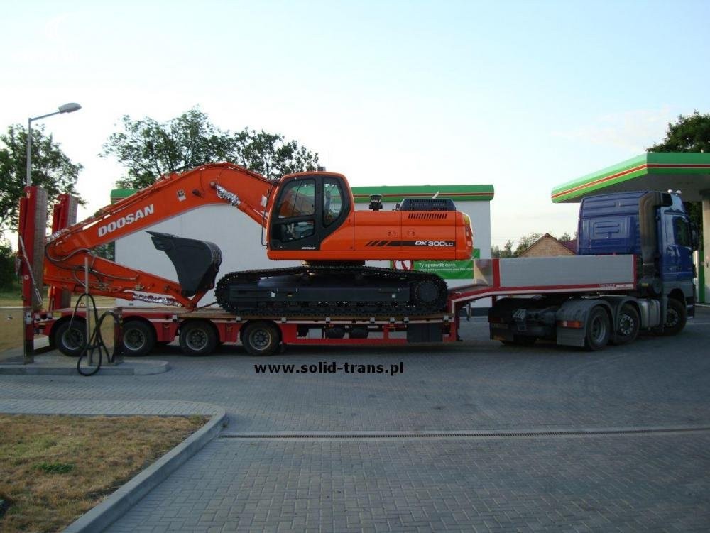 TRANSPORT MASZYN BUDOWLANYCH — zdjęcie 1