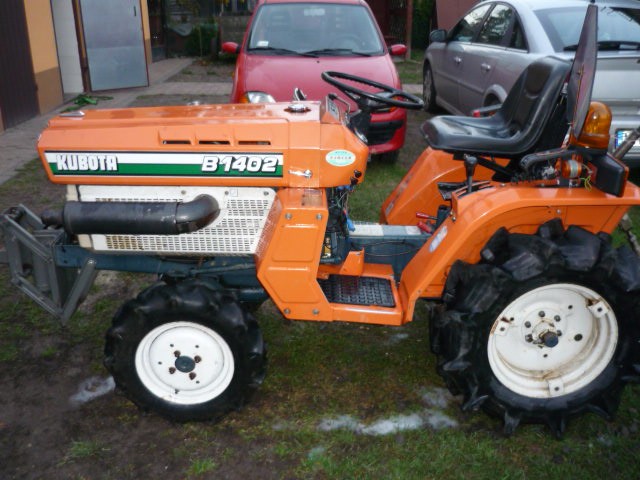 Kubota b1402 w komplecie z glebogryzarką, pługiem do śniegu — zdjęcie 1
