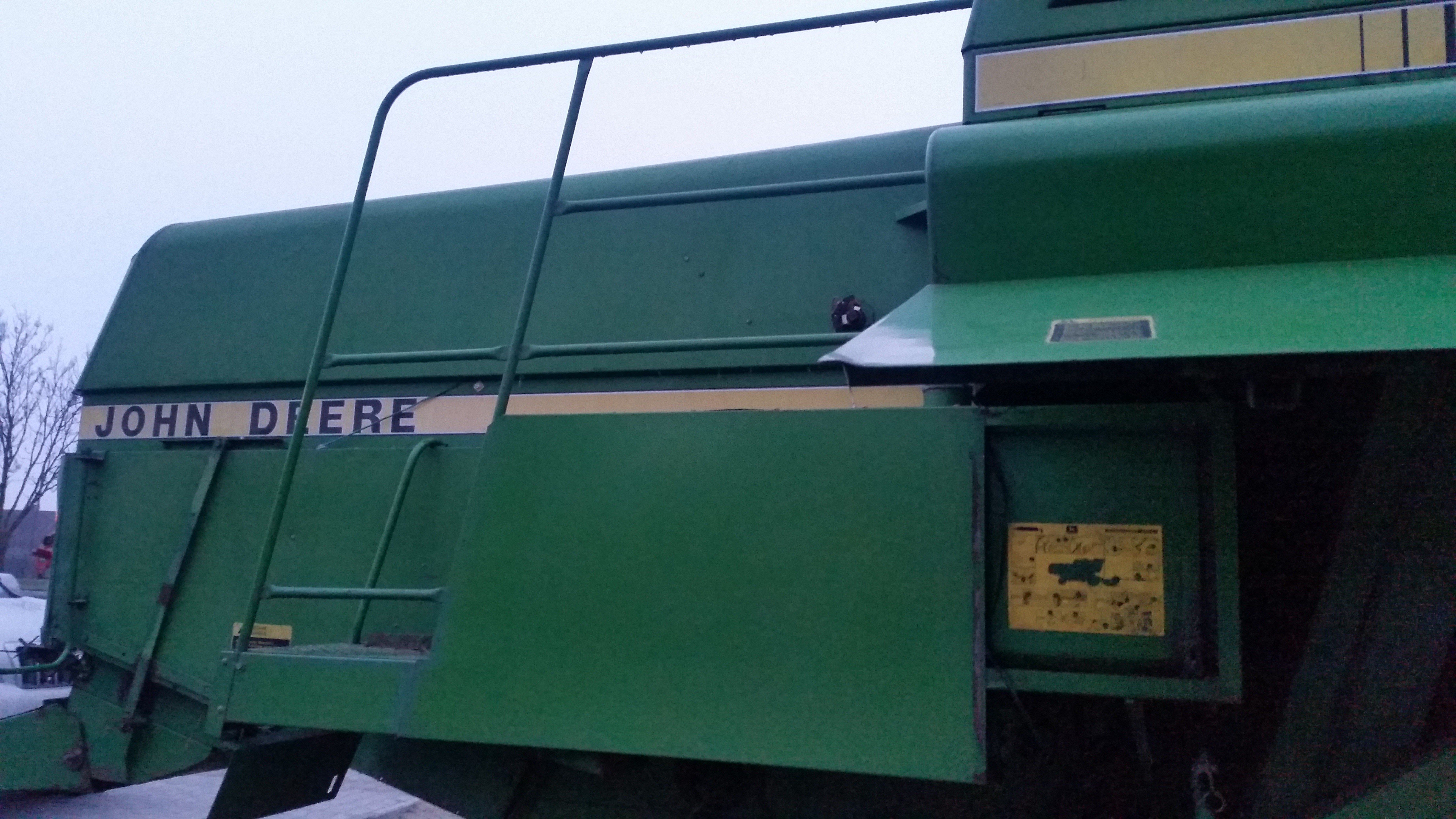 John Deere 1065 kombajn bizon — zdjęcie 6