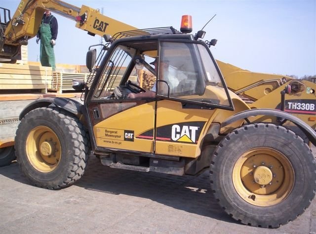 Ładowarka teleskopowa Caterpillar — zdjęcie 1