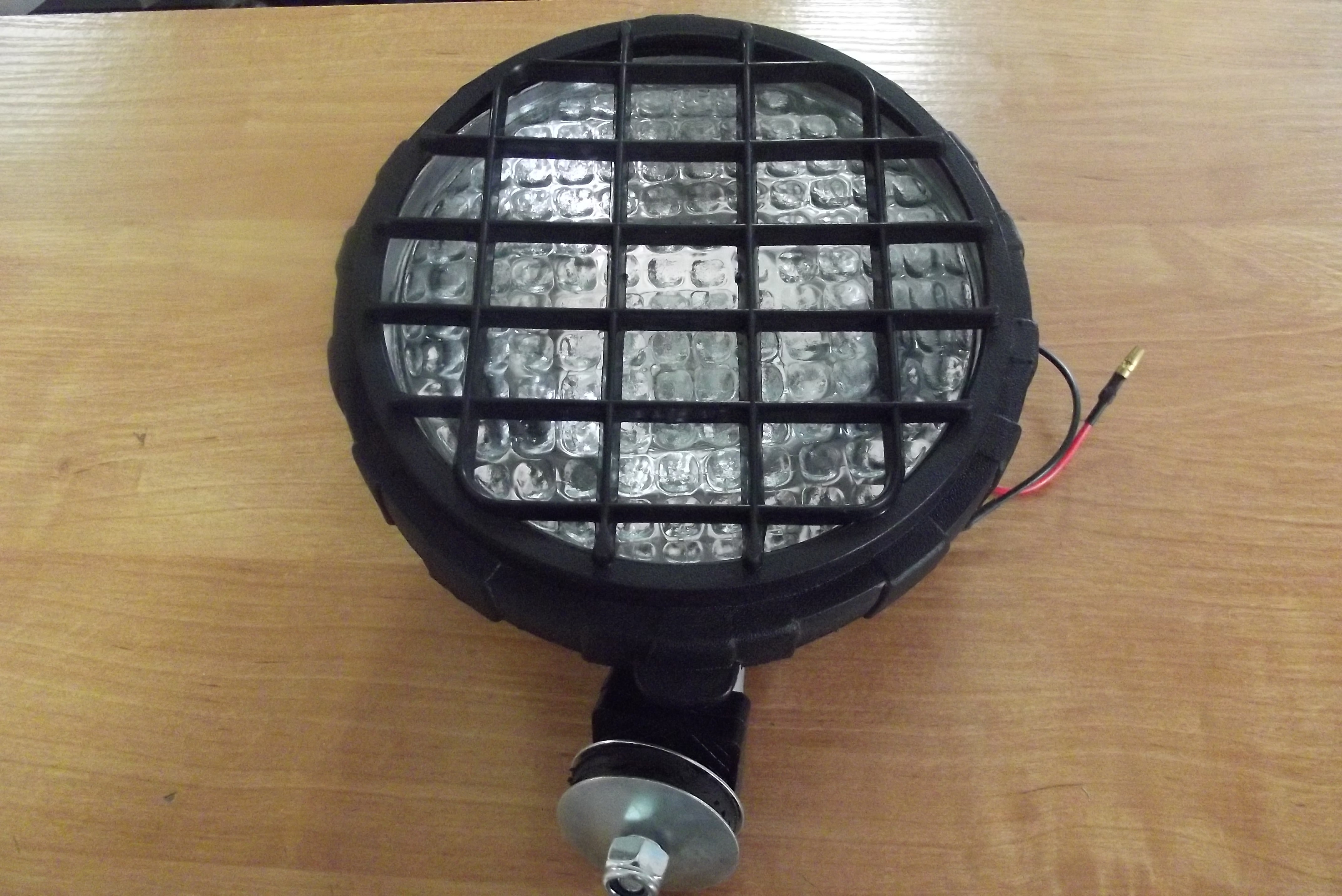 Lampa robocza okrągła z kratką i włącznikiem H3 12V/55W H3 24V/70W — zdjęcie 1
